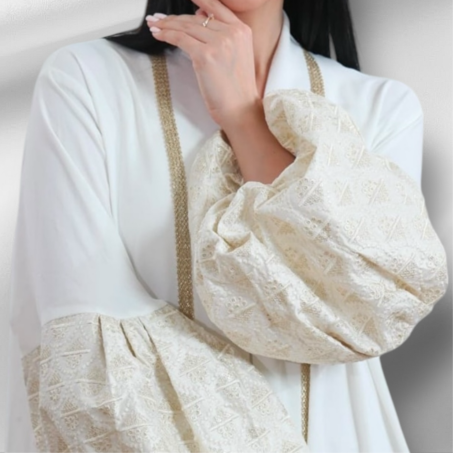 White and subtle gold puffy sleeved Abaya